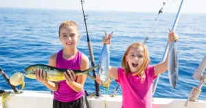 Reef Runners – Bottom Fishing Expedition catching snapper and grouper in clear tropical waters